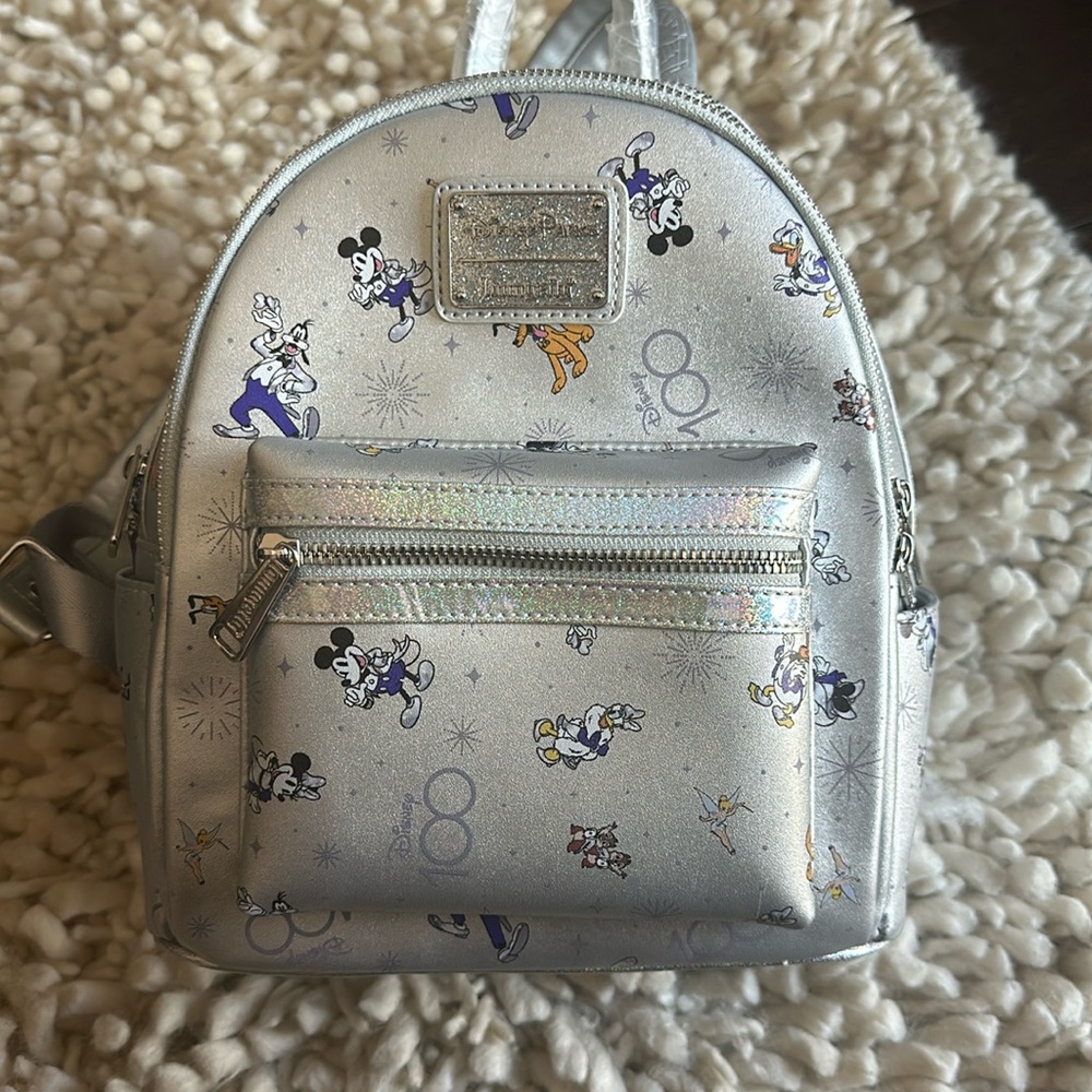 Authentic Disney Parks Loungefly 100th anniversay backpack.